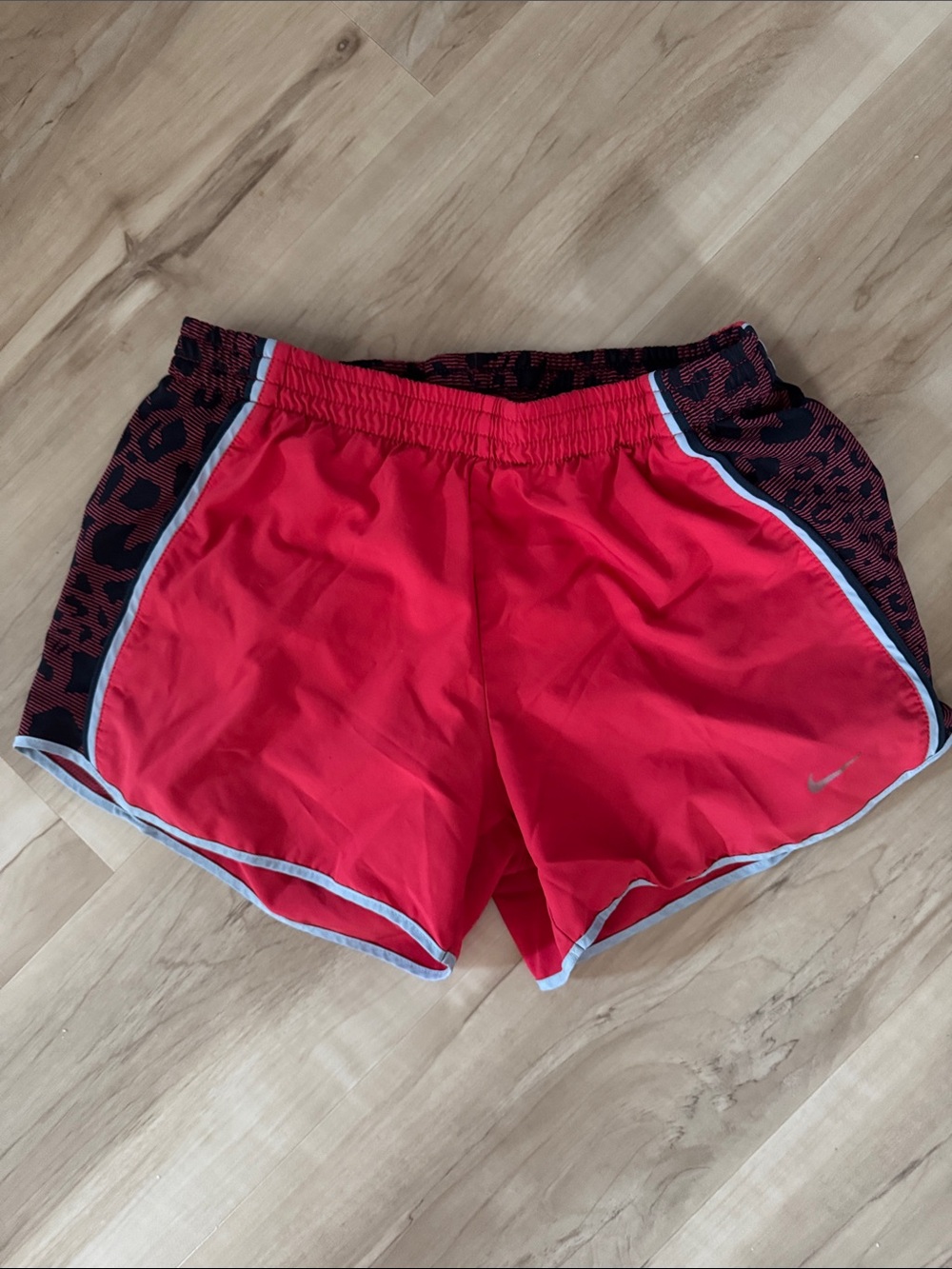 Nike Women’s Dri-fit Red Athletic Shorts with Black Leopard Side Panels